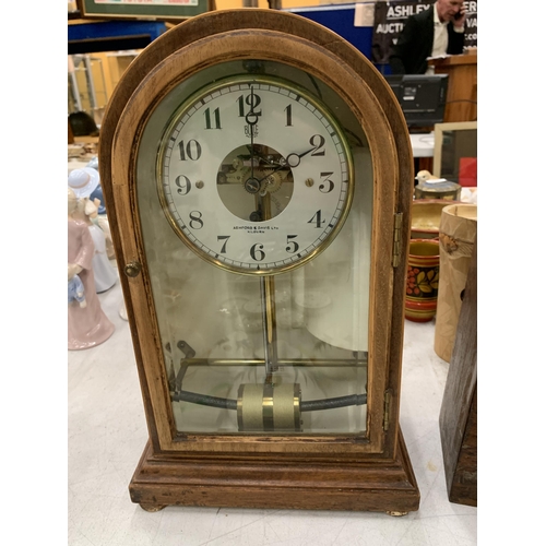 134 - AN ASHFORD AND DAVIES BULLE TURBINE, 1920'S MANTLE CLOCK, VENDOR STATES IN WORKING ORDER, NO WARRANT... 