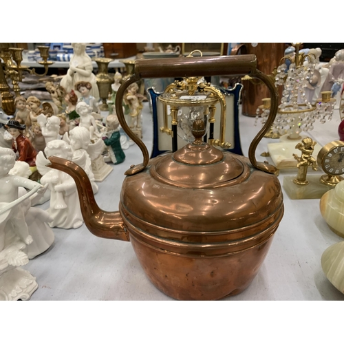 144 - TWO VINTAGE COPPER KETTLES, ONE BEING A MINIATURE