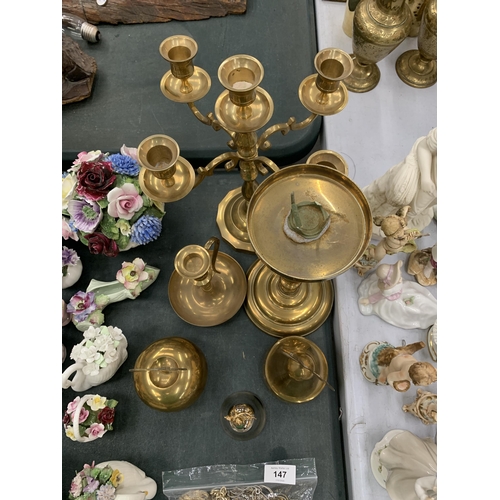 146 - A QUANTITY OF BRASSWARE TO INCLUDE CANDLESTICKS, AN APPLE AND PEAR TRINKET BOX