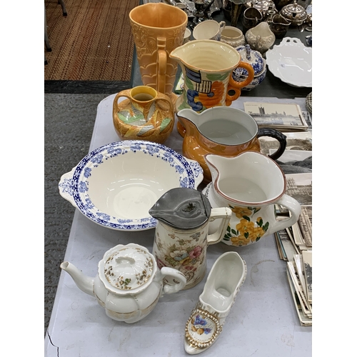 196 - A COLLECTION OF VINTAGE CERAMICS TO INCLUDE ART DECO JUGS, A BLUE AND WHITE BOWL, ETC