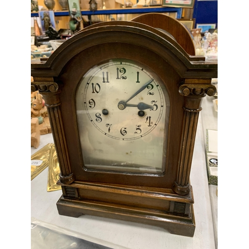 202 - TWO VINTAGE MANTLE CLOCKS TO INCLUDE AN EDWARDIAN WITH INLAID SHELL PATTERN AND A MAHOGANY CASED WIT... 