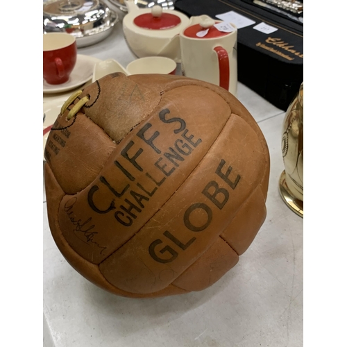 216 - A VINTAGE 'CLIFFS CHALLENGE GLOBE' LEATHER FOOTBALL WITH SIGNATURES