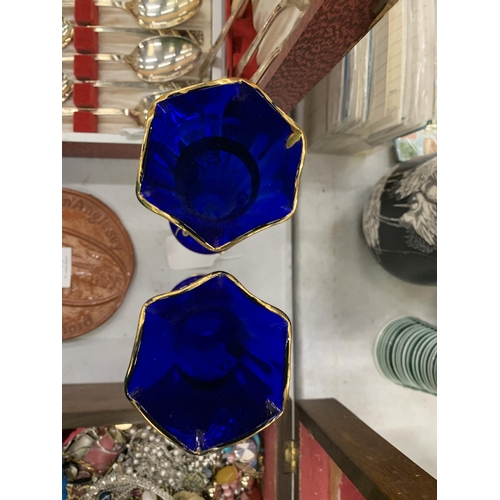 236 - A PAIR OF VINTAGE BOHEMIAN COBALT BLUE GLASS VASES WITH HAND PAINTED FLORAL DECORATION