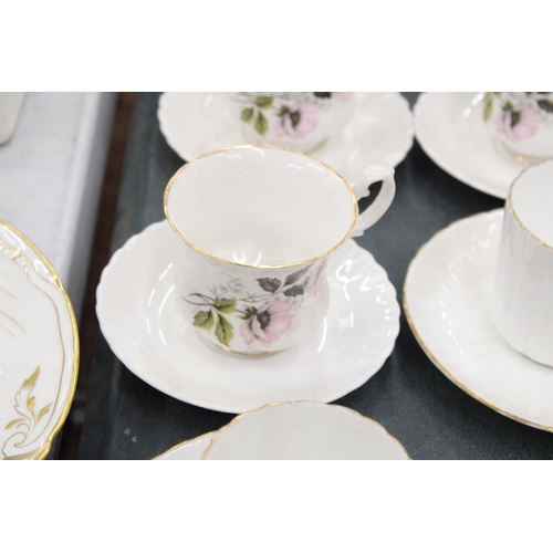 267 - A LARGE QUANTITY OF CHINA CUPS AND SAUCERS