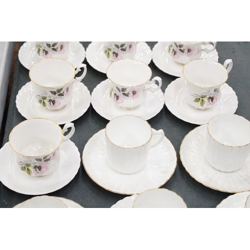 267 - A LARGE QUANTITY OF CHINA CUPS AND SAUCERS