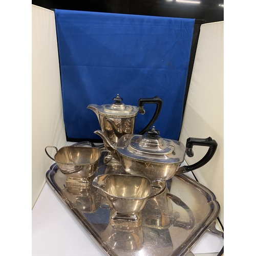 11 - A GARRARD AND CO LTD FIVE PIECE SILVER PLATED TEASET TO INCLUDE AN ENGRAVED TRAY, TEAPOT, COFFEE POT... 