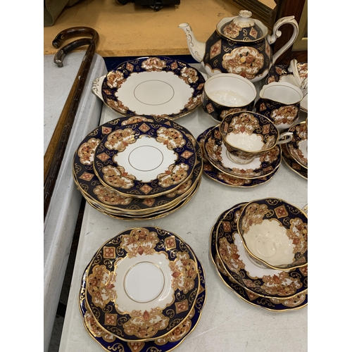 14 - A QUANTITY OF ROYAL ALBERT HEIRLOOM BONE CHINA TO INCLUDE A TEAPOT, SIGAR, MILK, TRIOS, CAKE PLATES ... 