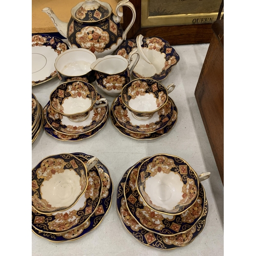 14 - A QUANTITY OF ROYAL ALBERT HEIRLOOM BONE CHINA TO INCLUDE A TEAPOT, SIGAR, MILK, TRIOS, CAKE PLATES ... 