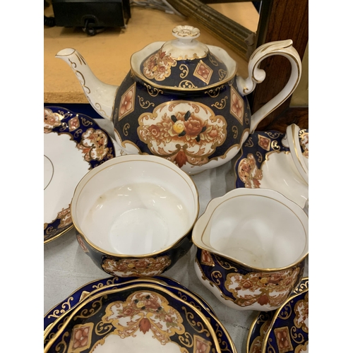 14 - A QUANTITY OF ROYAL ALBERT HEIRLOOM BONE CHINA TO INCLUDE A TEAPOT, SIGAR, MILK, TRIOS, CAKE PLATES ... 