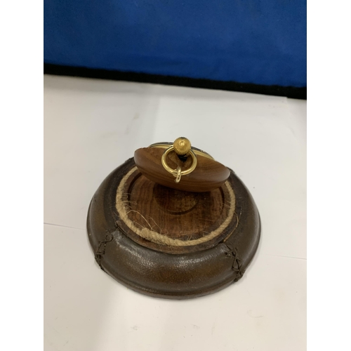 17 - A GOLD PLATED HALF HUNTER POCKET WATCH ON A LEATHER BOUND STAND