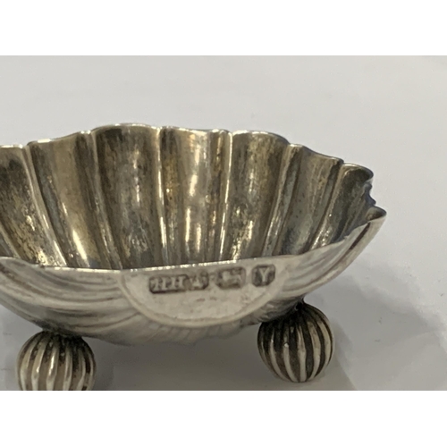 26 - TWO HALLMARKED SILVER SCALLOP SHAPED SALTS