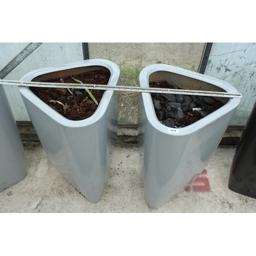 1676 - A PAIR OF TALL TRIANGULAR GREY FIBRE GLASS PLANTERS (H:72CM)