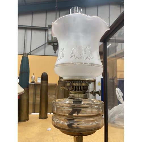 65 - A VINTAGE BRASS OIL LAMP WITH GLASS RESERVOIR, OPAQUE ETCHED GLASS SHADE AND FUNNEL, HEIGHT APPROX 5... 