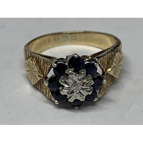 561 - A 9 CARAT GOLD RING WITH DIAMONDS AND SAPPHIRES SIZE I/J