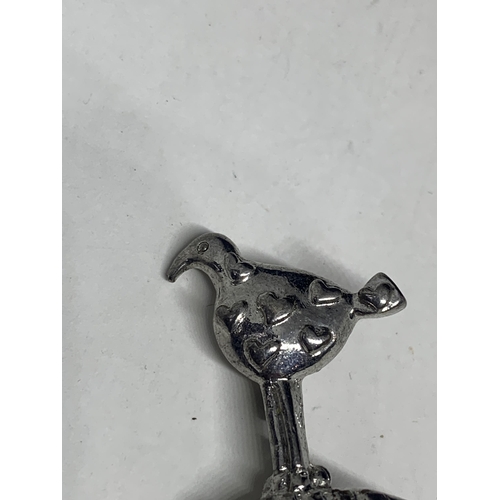 570 - AN AMERICAN SILVER BIRD BROOCH