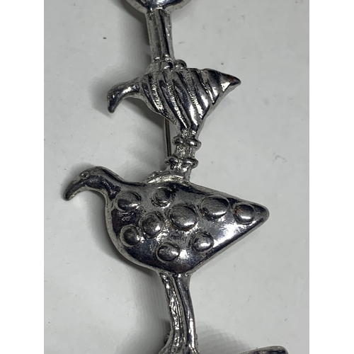 570 - AN AMERICAN SILVER BIRD BROOCH