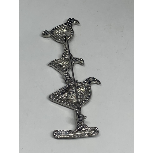 570 - AN AMERICAN SILVER BIRD BROOCH