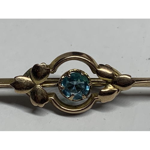 590 - TWO VINTAGE MARKED 9 CARAT GOLD BROOCHES TO INCLUDE ONE WITH A BLUE STONE