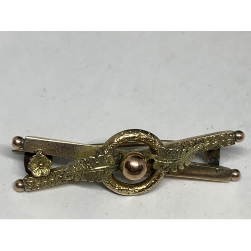 591 - TWO VINTAGE MARKED 9 CARAT GOLD BROOCHES ONE WITH A SEED PEARL SWALLOW DESIGN AND SAFETY CHAIN