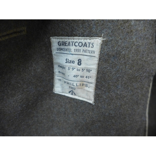 272A - A ROYAL ARTILLERY GREATCOAT DATED 1952, SIZE 8