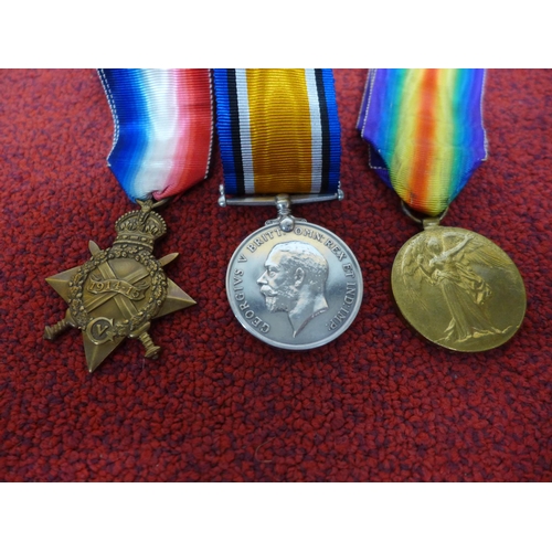 474 - A WORLD WAR I TRIO AWARDED TO 1213 PRIVATE E. HOUGH MANCHESTER REGIMENT