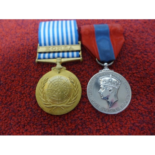 479 - A UNITED NATIONS KOREAN WAR MEDAL AND A FAITHFUL SERVICE MEDAL AWARDED TO JOSEPH BIRKLEY FORSTER (2)