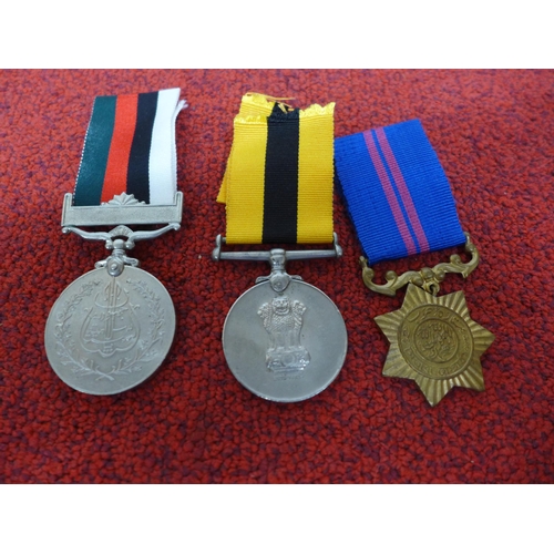 484 - A PAKISTAN WAR MEDAL, FURTHER PAKISTAN MEDAL DATED 1956 AND ANOTHER DATED 1965 (3)