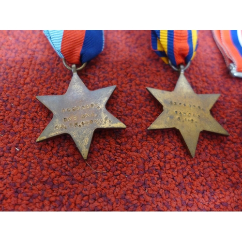 485 - THREE WORLD WAR II NAMED MEDALS COMPRISING 1939-45 STAR, BURMA STAR 1938 - 45 MEDAL, DEFENCE MEDAL A... 