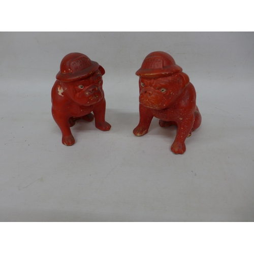 490 - A RARE PAIR OF WORLD WAR II PAINTED POTTERY FIGURES OF BRITISH BULLDOGS WEARING TIN HATS WITH THE WO... 