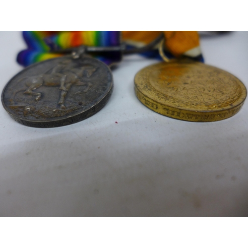 493 - A WORLD WAR I MEDAL PAIR AWARDED TO S11909 ACTING CORPORAL H.HARRISON OF THE SEAFORTH HIGHLANDERS AN... 