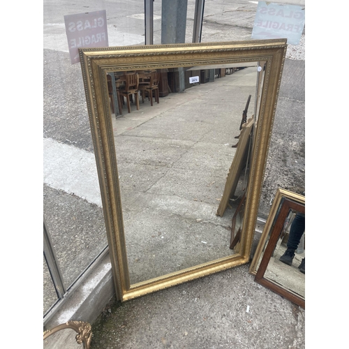 2973 - A GILT EFFECT BEVEL EDGE WALL MIRROR, 49