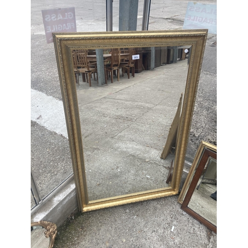 2973 - A GILT EFFECT BEVEL EDGE WALL MIRROR, 49