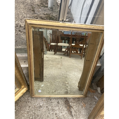 2974 - A GILT FRAMED BEVEL EDGE WALL MIRROR, 22