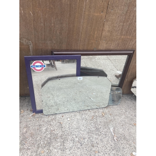 2977 - AN UNFRAMED WALL MIRROR, DRESSING TABLE MIRROR AND TWO OTHER MIRRORS