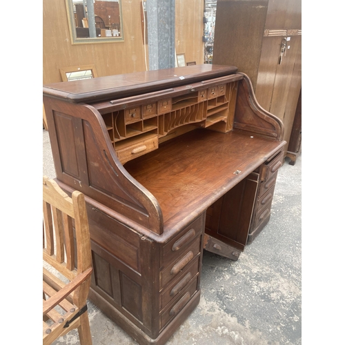 3003 - AN EARLY 20TH CENTURY TWIN-PEDESTAL MAHOGANY ROLL-TOP DESK ENCLOSING EIGHT DRAWERS AND TWO SLIDES, 6... 