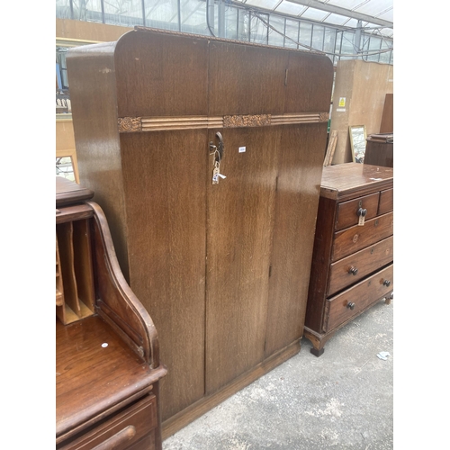 3004 - A MID 20TH CENTURY OAK WARDROBE, 47