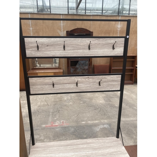 3013 - A METAL FRAMED COAT/HAT RACK WITH TWO TIER BASE, 40