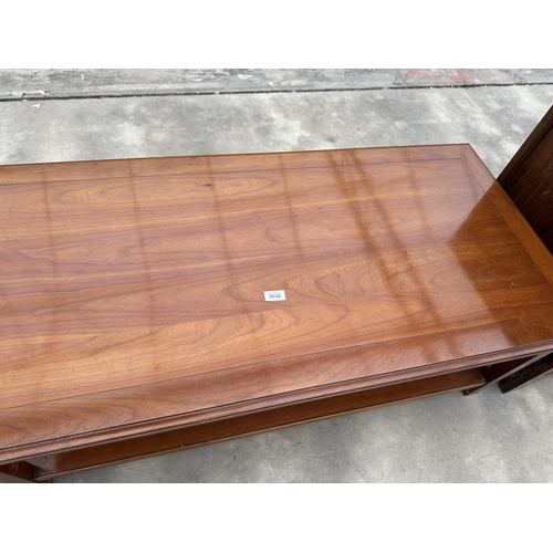 3032 - A CHERRY WOOD TWO TIER COFFEE TABLE WITH BRASS FEET, 47