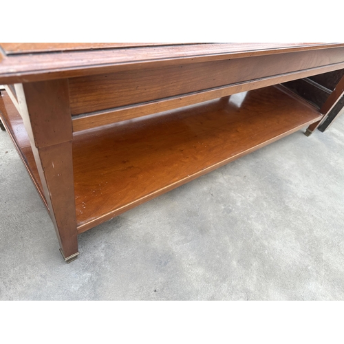 3032 - A CHERRY WOOD TWO TIER COFFEE TABLE WITH BRASS FEET, 47