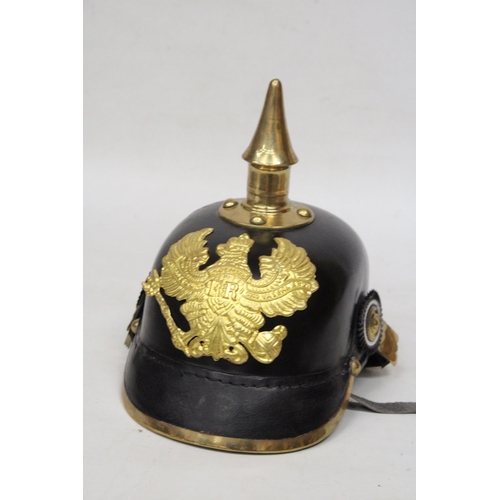 300A - A REPLICA WW1 GERMAN PICKLHAUBE HELMET