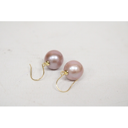 611 - A PAIR OF MARKED 18K EARRINGS WITH AKOYA PEARLS GROSS WEIGHT 3.6 GRAMS