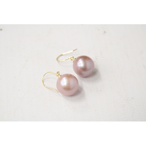 611 - A PAIR OF MARKED 18K EARRINGS WITH AKOYA PEARLS GROSS WEIGHT 3.6 GRAMS