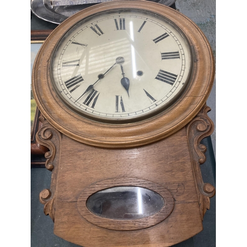 70 - A VICTORIAN STYLE OAK CASED WALL CLOCK WITH PENDULUM