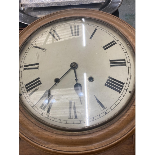 70 - A VICTORIAN STYLE OAK CASED WALL CLOCK WITH PENDULUM