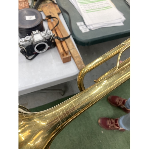 79 - A VINTAGE ELKHART PIONEER BRASS TRUMPET WITH MOUTHPIECE, SOFT CASE AND MUSIC HOLDER