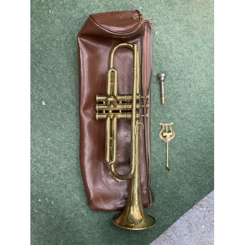 79 - A VINTAGE ELKHART PIONEER BRASS TRUMPET WITH MOUTHPIECE, SOFT CASE AND MUSIC HOLDER