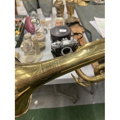 79 - A VINTAGE ELKHART PIONEER BRASS TRUMPET WITH MOUTHPIECE, SOFT CASE AND MUSIC HOLDER