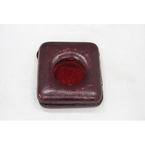 85 - A VINTAGE RED LEATHER POCKET WATCH CASE WITH RED INTERIOR