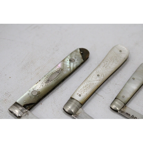 89 - FOUR STERLING SILVER AND MOTHER OF PEARL FRUIT KNIVES