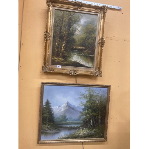 94 - TWO OIL PAINTINGS TO INCLUDE A GILT FRAMED OIL ON BOARD OF A MOUNTAINOUS, WOODLAND, LAKE SCENE SIGNE... 